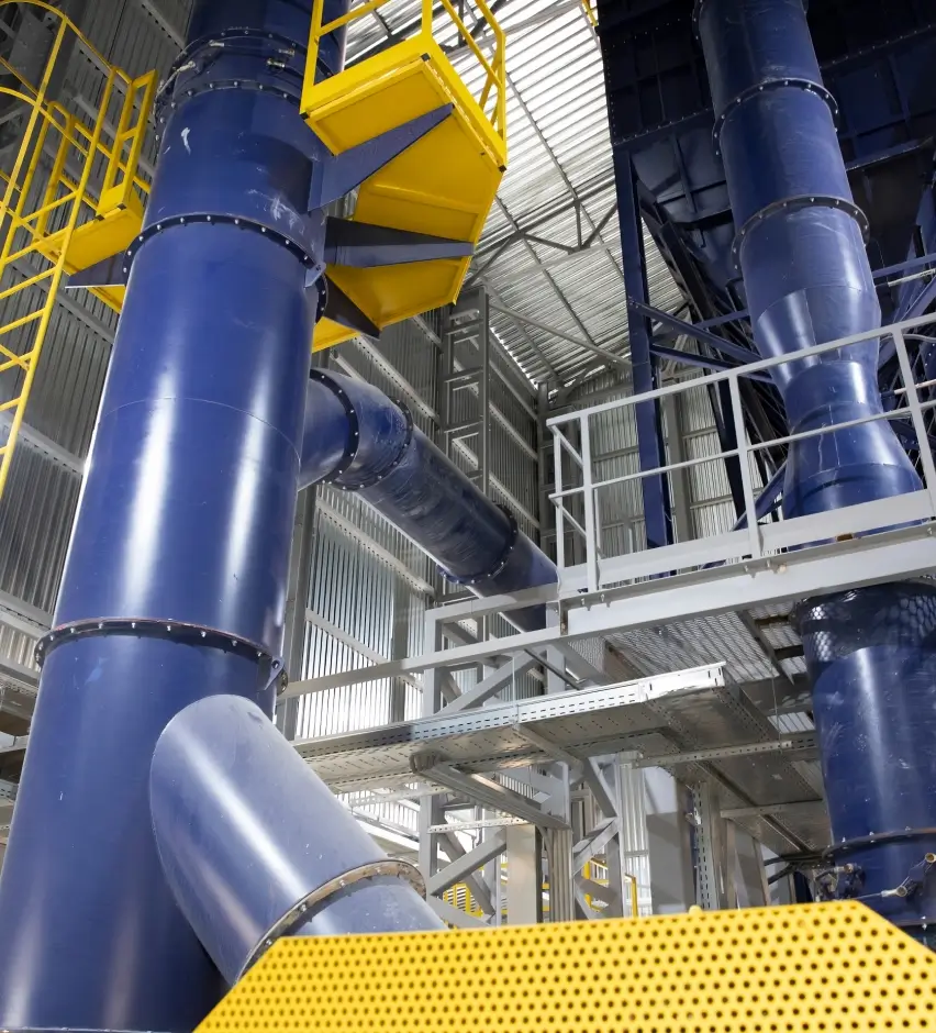 Industrial piping and metal structures in a manufacturing plant